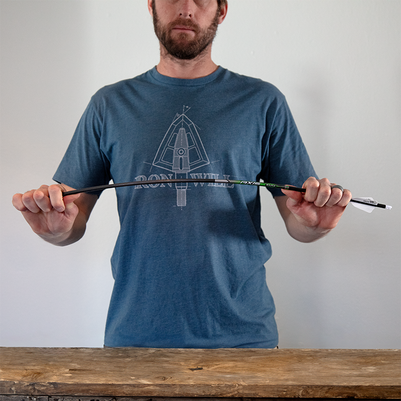 flexing an arrow into an arc