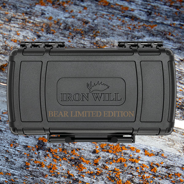 Iron Will case with text that says Bear Limited Edition on wood