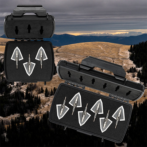 S Series broadheads in open cases with mountain background. 