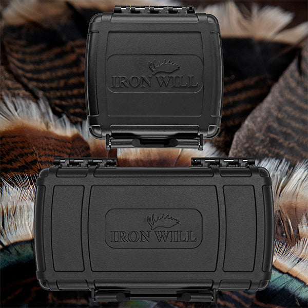 Turkey and Small Game Broadheads in their 3 and 6 pack cases over a turkey fan